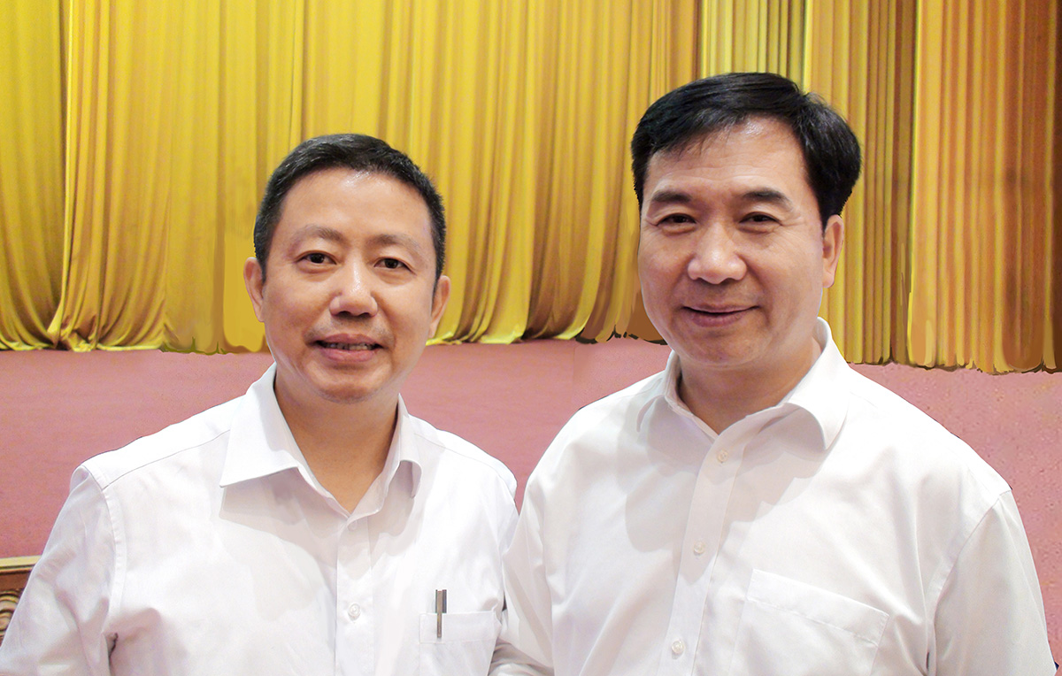 中央政治局常委、中央紀(jì)律檢查委員會書記李希與周海江合影